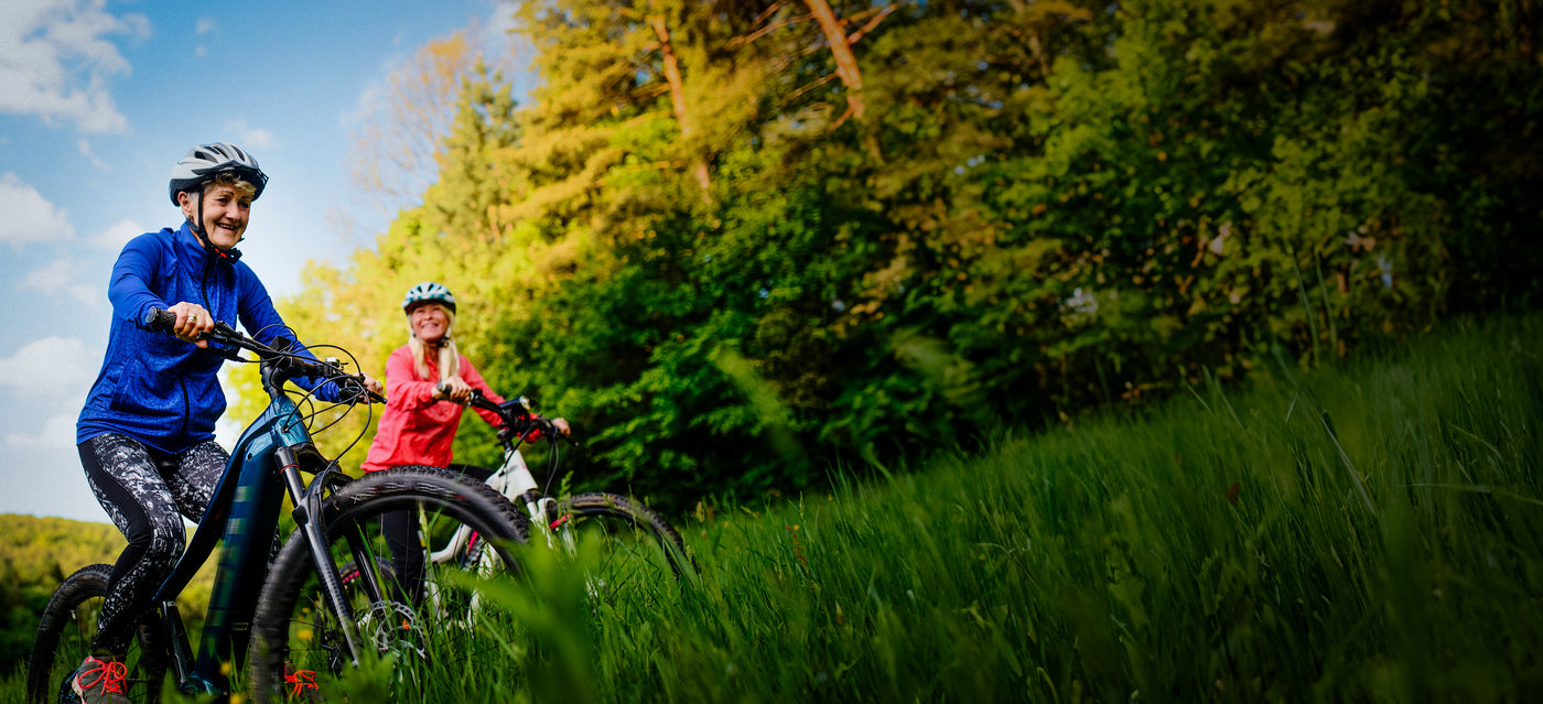 Two Elderly women ejoying their bike ride.