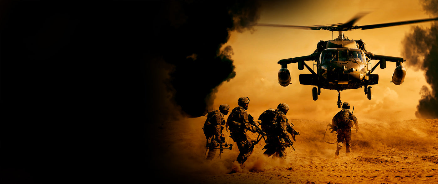 Soldiers on battlefield boarding helicopter